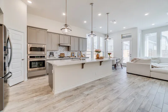 Greige kitchen with quartz island