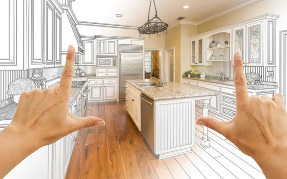 Hands framing a kitchen that blends from design sketch into the finished room